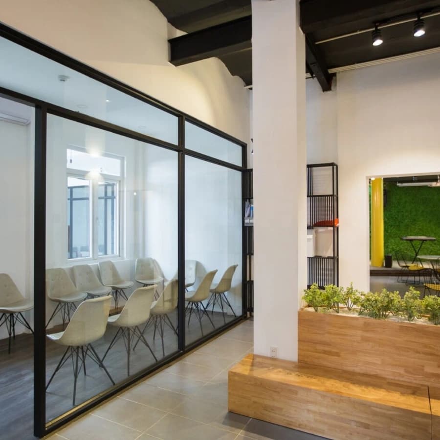Clean glass partition in a bright modern interior